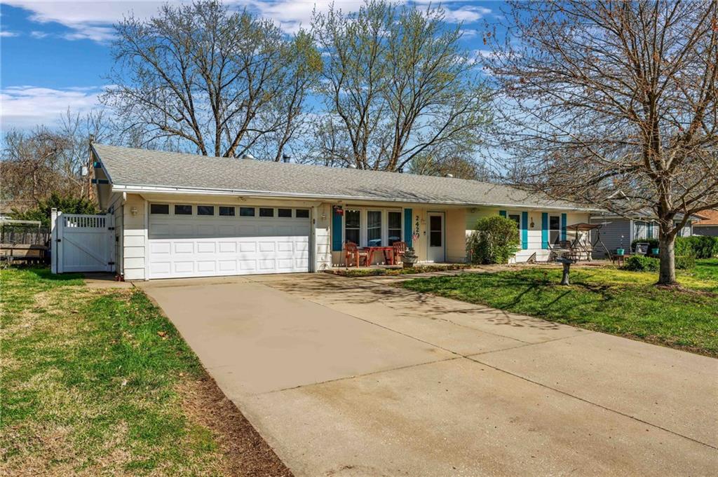 2420 BROOKSIDE DRIVE, LAWRENCE, KS 66047