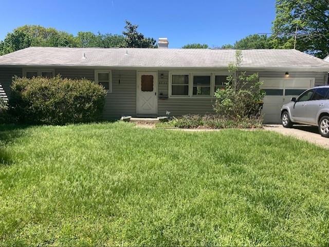 5546 N Woodland Avenue, Kansas City, MO 64118 photo