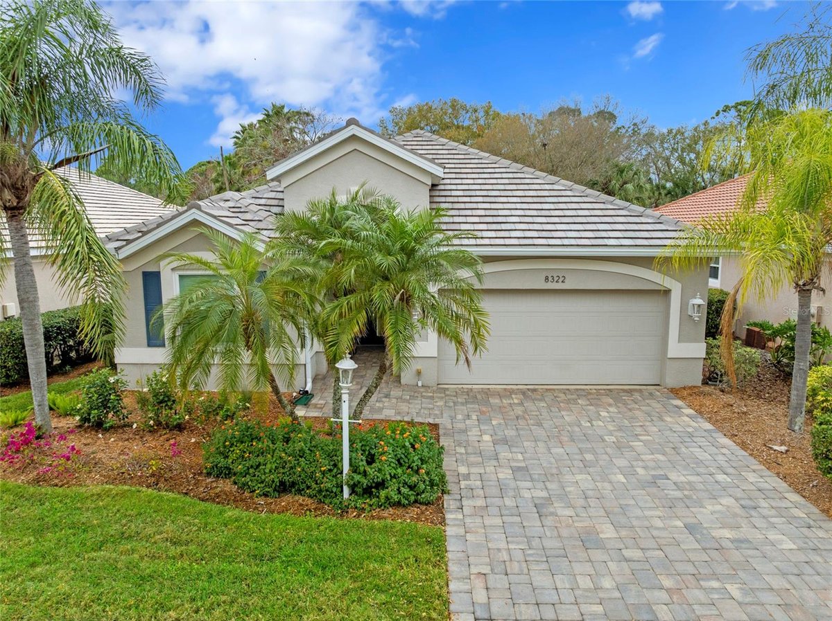 8322 WHISPERING WOODS COURT