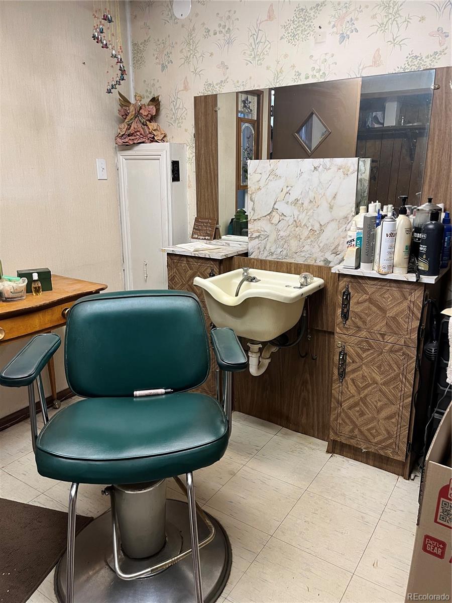 Front exterior of a two-story home with siding and brick accents